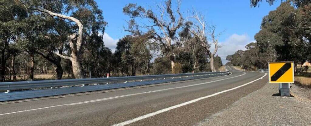 BIKER-SHIELD™️ Guardrail crash barrier near trees