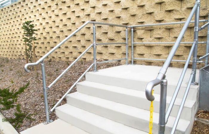 Triple rail Stairs Handrail installed at facility entrance