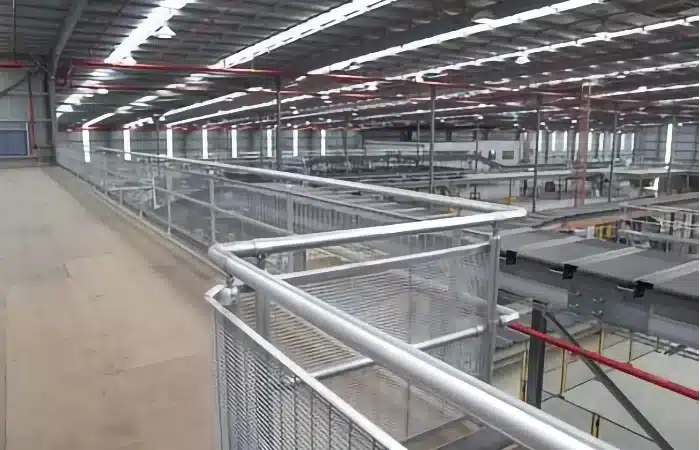 Handrail system installed in warehouse