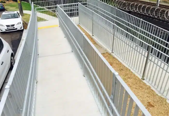 Pedestrian fencing in walkway of train station