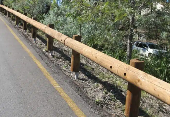 EZY-GUARD road guardrail installed on a grass-covered roadside