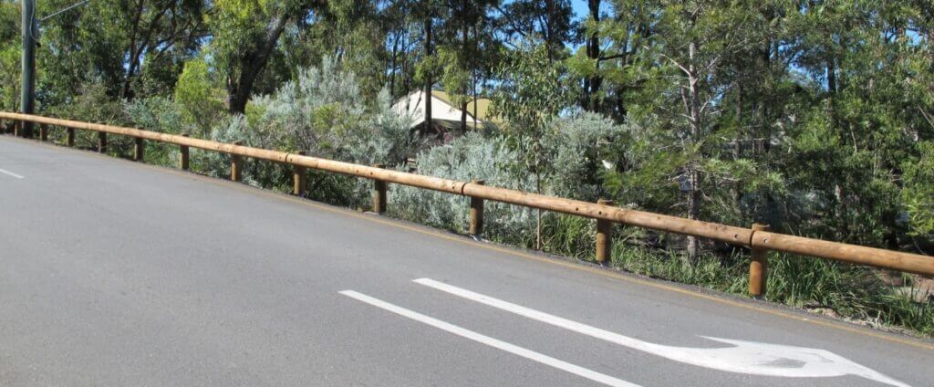 T18 Log wooden Car Park Barrier installed on road
