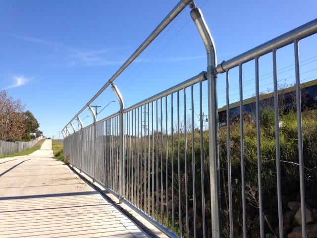 Tripple Handrail system installed near walkway