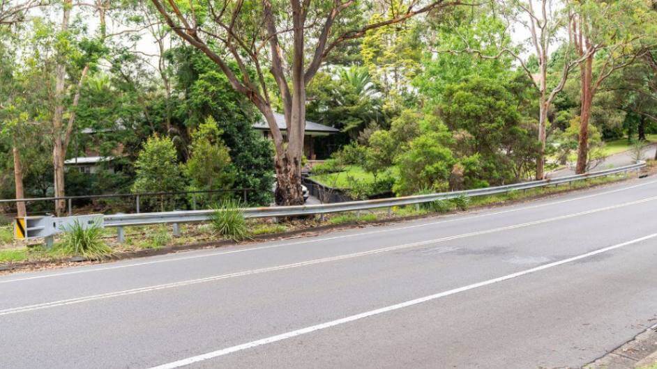 Gilbert Rd roadside crash barriers with departure terminal barrier, a commercial fencing service provided by metal fencing specialist