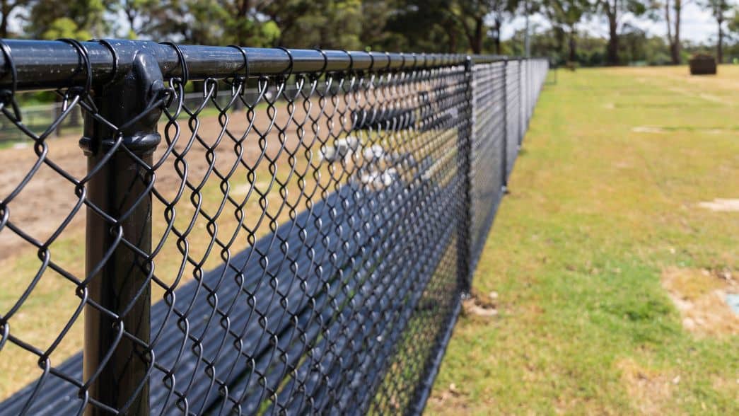 Chainwire pedestrian fencing barrier installed on football field in Kenthurst Park