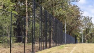 Chain wire security fencing installation at Kenthurst Park with black finish