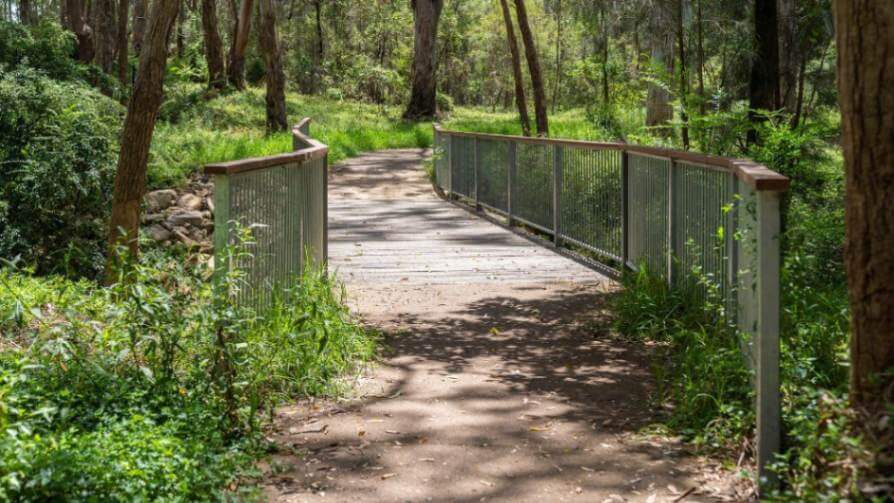 Custom fabricated galvanised balustrade with timber hardtop for Rouse Hill bridge project